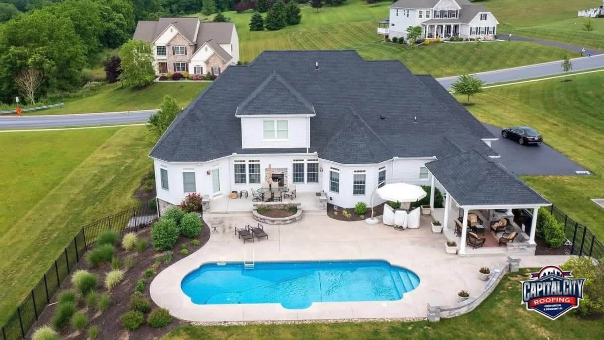 Suburban Estate Pool Home Full Roof Replacement photo 1