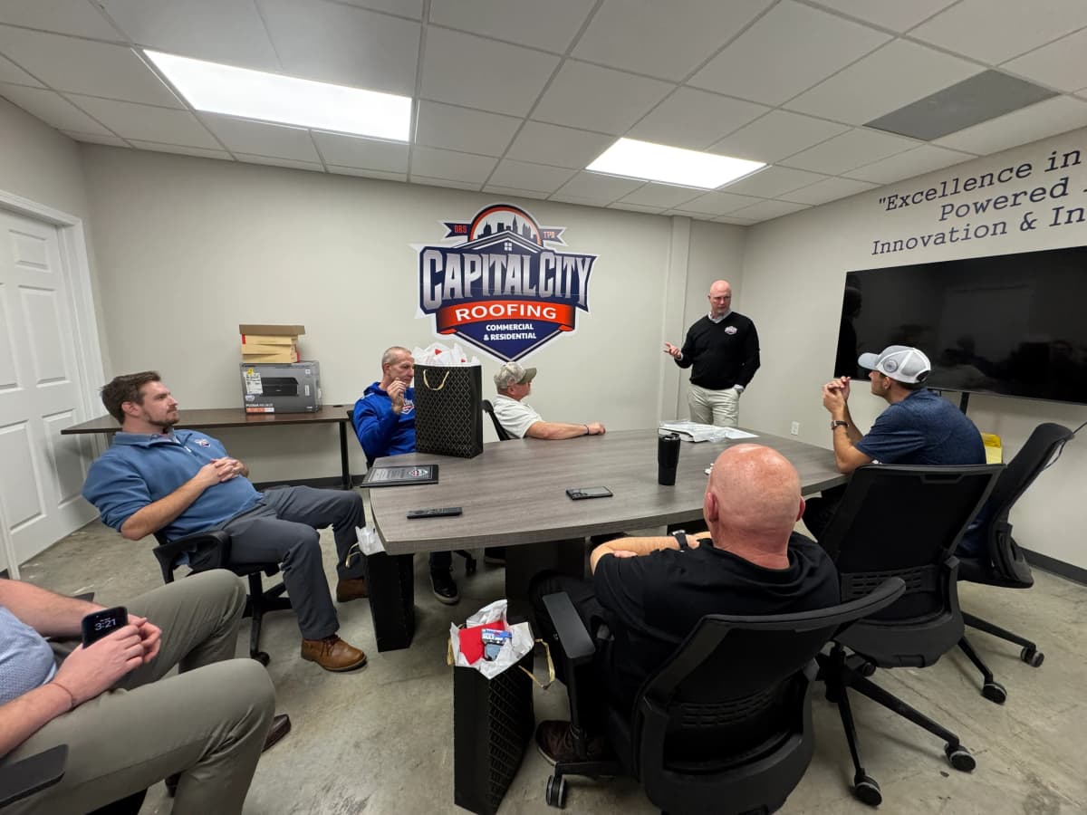 Capital City Roofing leadership team meeting at Alpharetta headquarters
