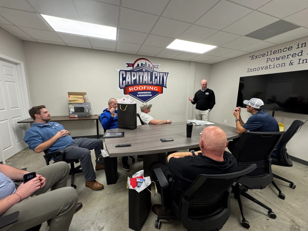 Capital City Roofing leadership team meeting at Alpharetta headquarters