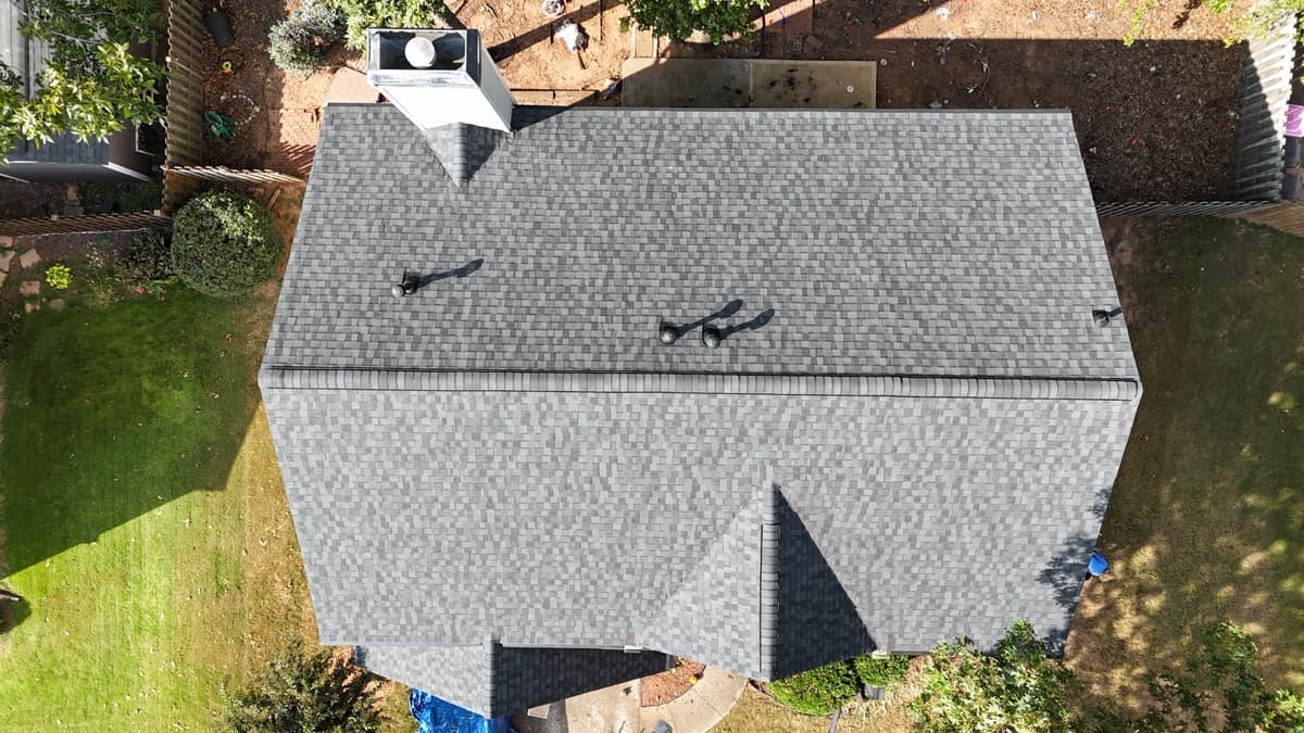 Johns Creek CertainTeed Landmark Pro Moire Black shingle replacement on steep-slope Tudor home